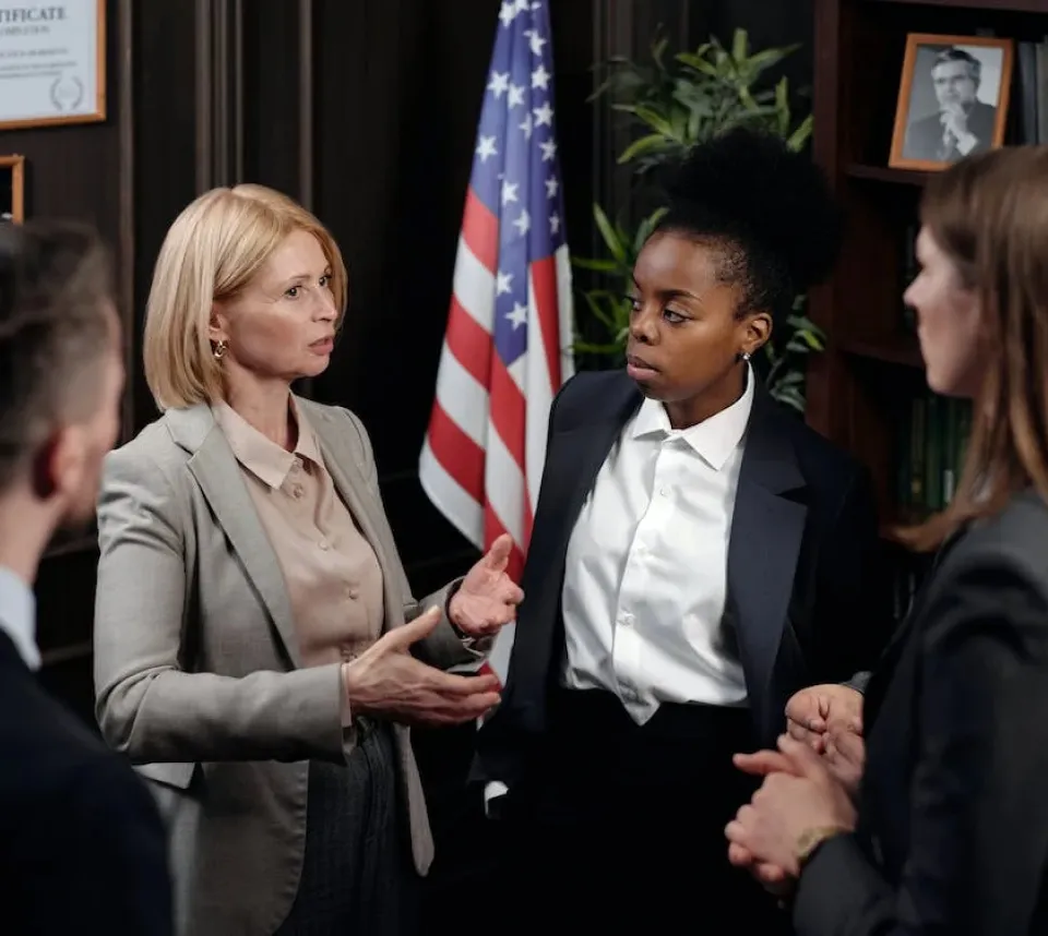 Attorney advising clients in a meeting